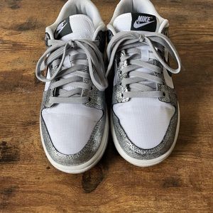 Nike dunks size 8 Women’s metallic silver& off white. Lightly worn.